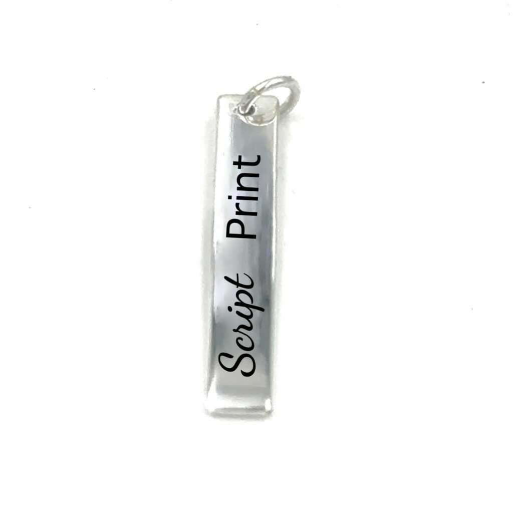 engraved sterling silver rectangle tag. engrave names in script or print.